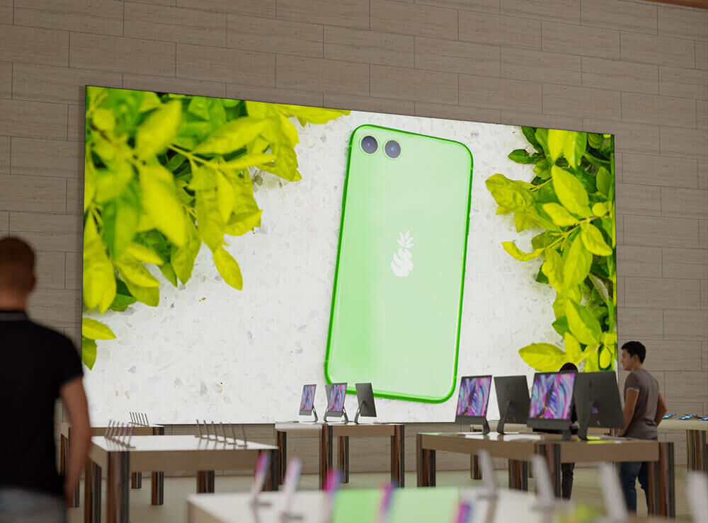 Apple Store mit Tischen auf den Apple Produkte sind und an Wand, Flatpanel befestigt mit Textildruck