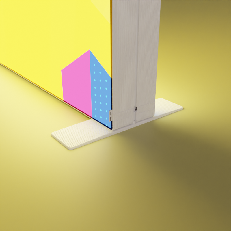 PIXLIP GO untere Ecke mit PIXLIP GO Fußplatte montiert auf gelbem Boden